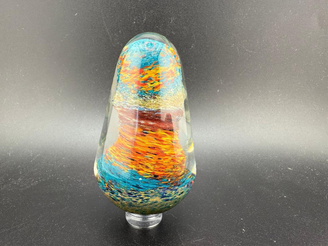 Handcrafted Paulson Pieces Easter Egg Marble featuring vibrant colors of blue, orange, and yellow, made in Spokane, WA.