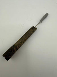 Stone Cold Creations 4" stone dab tool, featuring unique textures and a sleek metal tip for optimal dabbing.