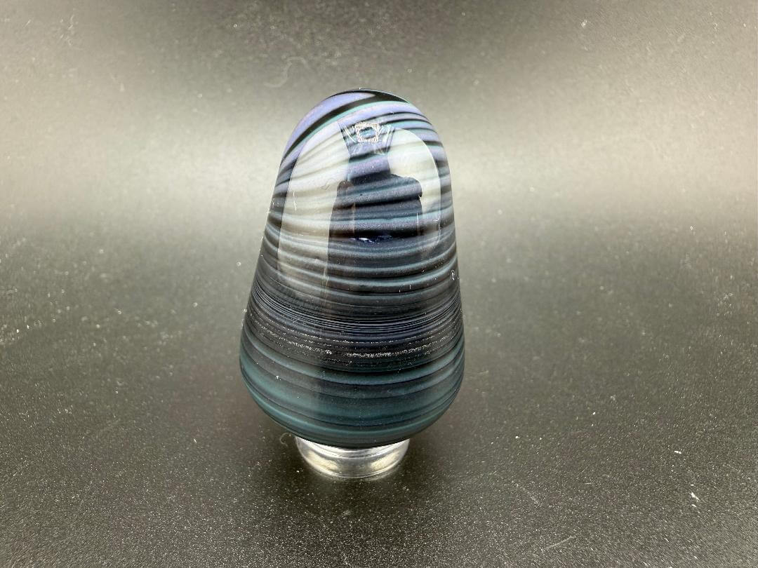 Handcrafted Paulson Pieces Easter Egg Marble in assorted colors, featuring a colorful striped design, made in Spokane, WA.