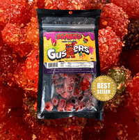 Bombies Gushers candy package featuring bold red gummies and a 'Best Seller' badge, perfect for sweet and spicy flavor lovers.