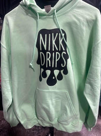 Nikk Drips Hoodie with Vinyl Logo in mint green featuring a bold black logo design.