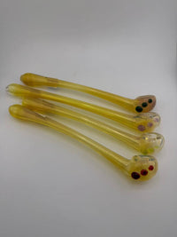 Colorful handcrafted smoking pipes featuring unique designs and vibrant glass accents.