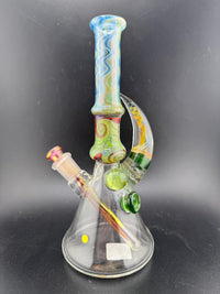 Brando Glass Wig Wag Space Tech Beaker in green and red, handcrafted American glass, showcasing dynamic wig wag design.