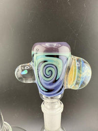 Highgrade Heady Slide bowl with vibrant swirl design, showcasing unique glass artistry in 14mm size.