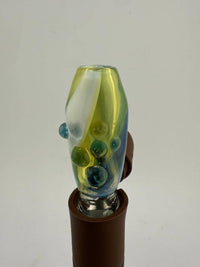 Paulson Pieces Green Puffco Pivot Topper with colorful glass design, enhancing airflow and heat retention for dabbing.