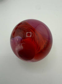 Handcrafted medium-sized marble slurper top, showcasing vibrant red and purple swirls, perfect for enhancing performance.