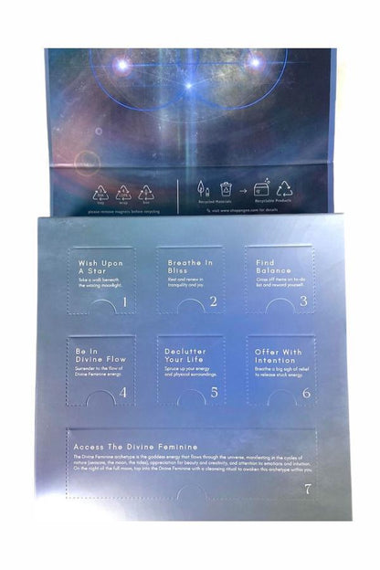 Open calendar featuring seven tabs with spiritual themes for the Lunar Goddess advent guide.