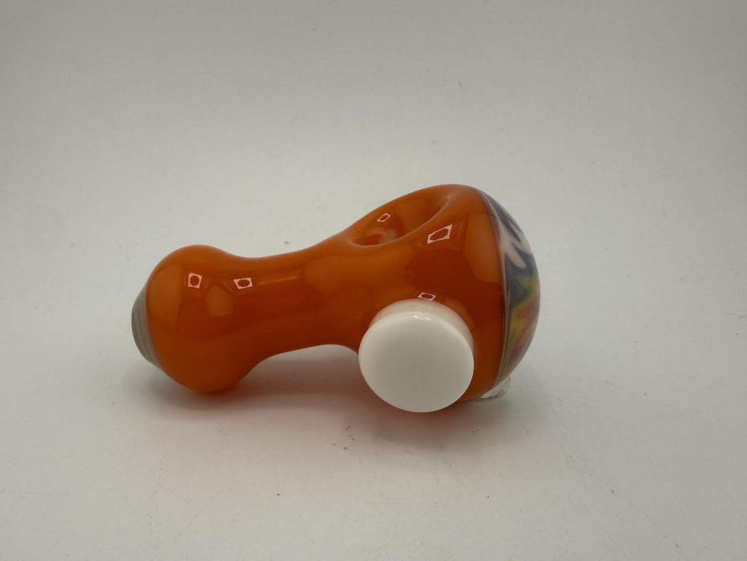 Mcdoogle Dry Pipe in vibrant orange color, featuring a unique design and smooth finish, perfect for various smoking experiences.
