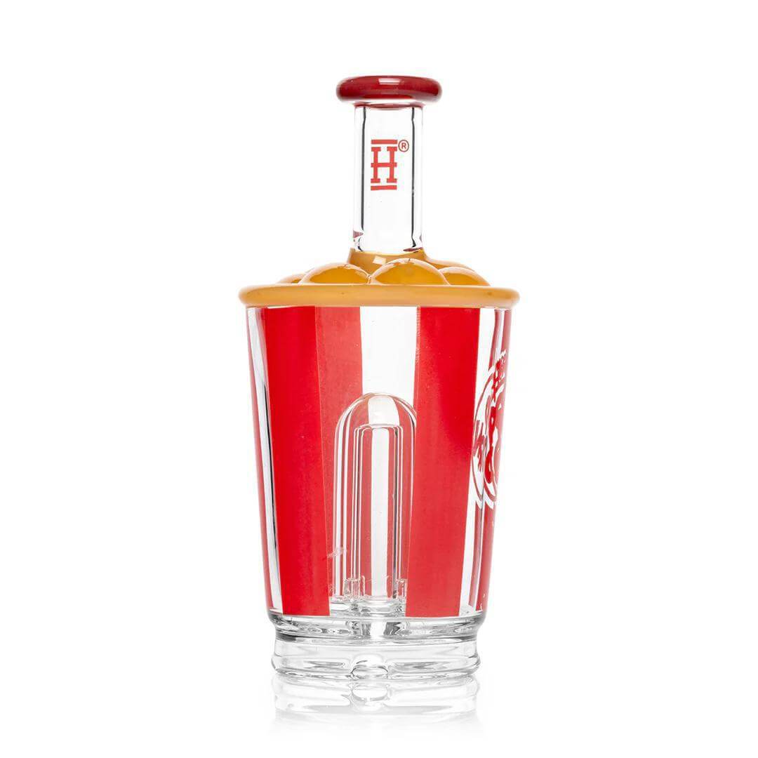Hemper Popcorn Puffco Peak Attachment shaped like a popcorn bucket with yellow top and red stripes for enhanced dabbing sessions.