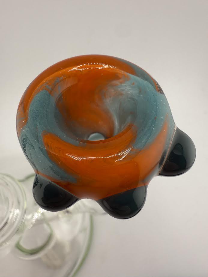 Top view of Crondo Glass Frit Swirl 14mm Bowl featuring vibrant orange and teal swirl design.