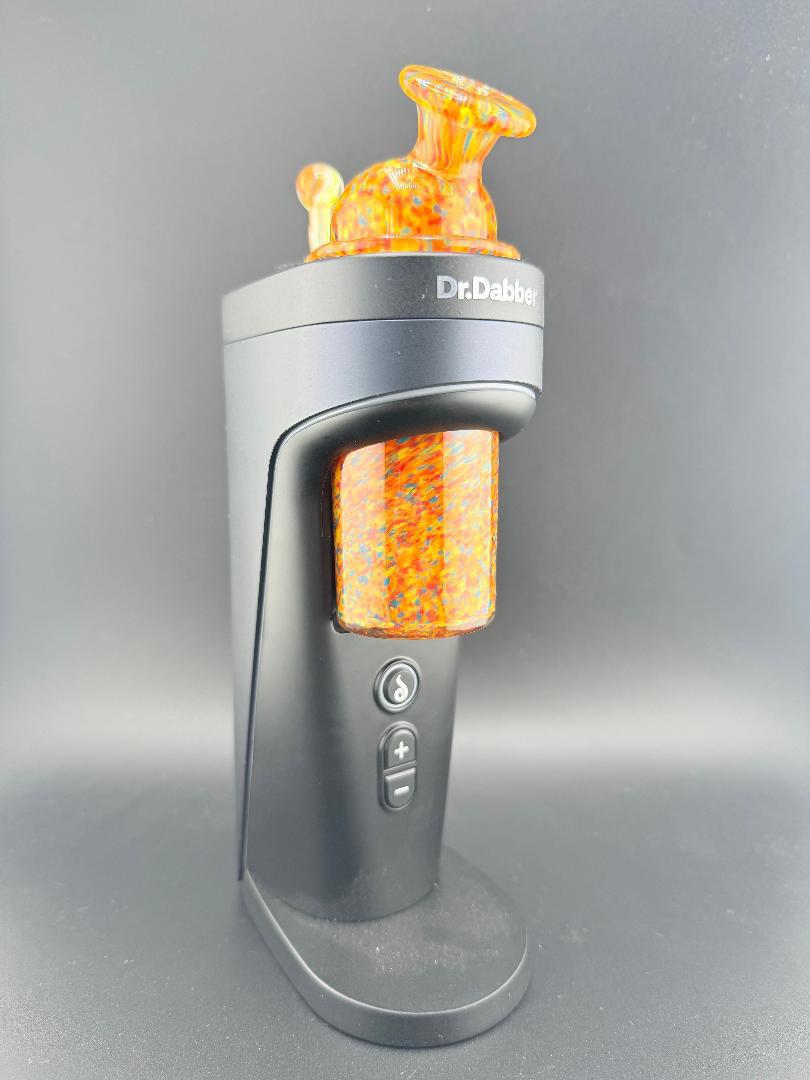 Dr. Dabber Switch 2 with Paulson Pieces Replacement Glass & Cap in orange confetti design for enhanced vapor experience.