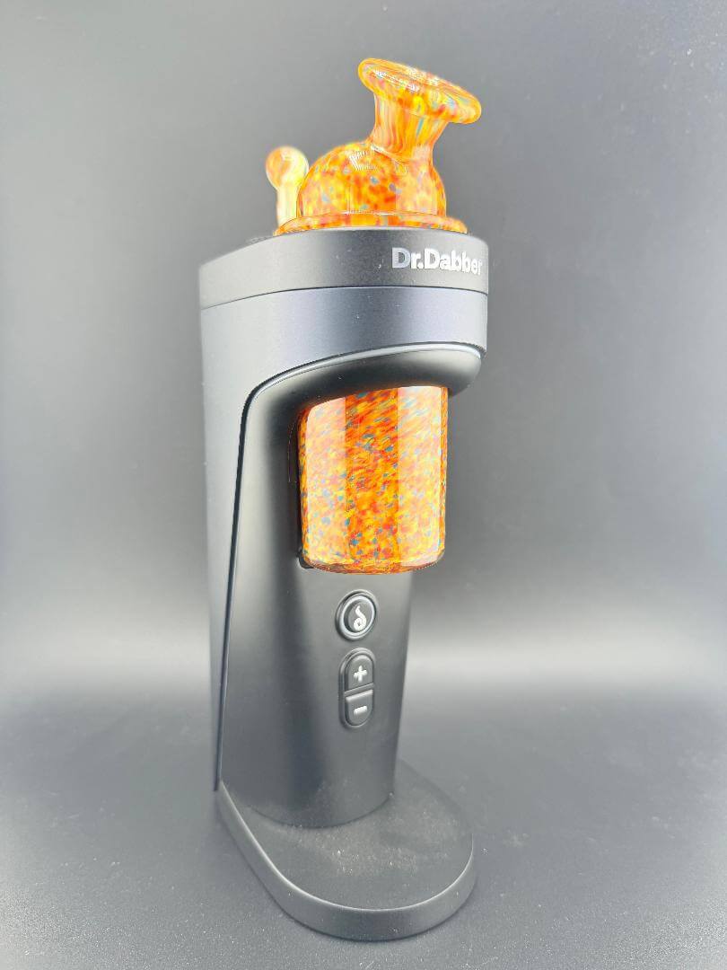Dr. Dabber Switch 2 with Paulson Pieces Replacement Glass & Cap in orange confetti design for enhanced vapor experience.