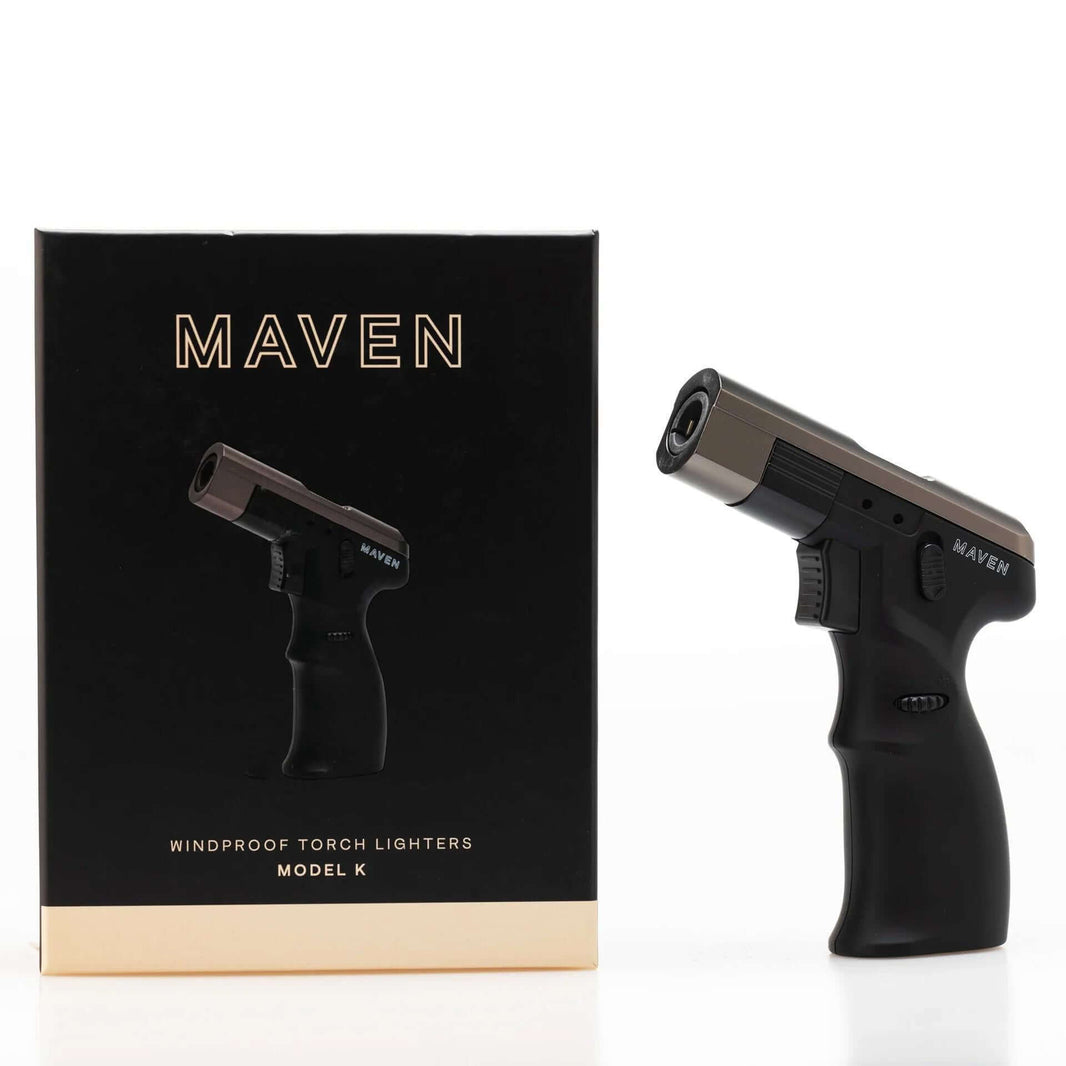 Maven Model K Butane Torch next to its box, showcasing its sleek design and windproof features.