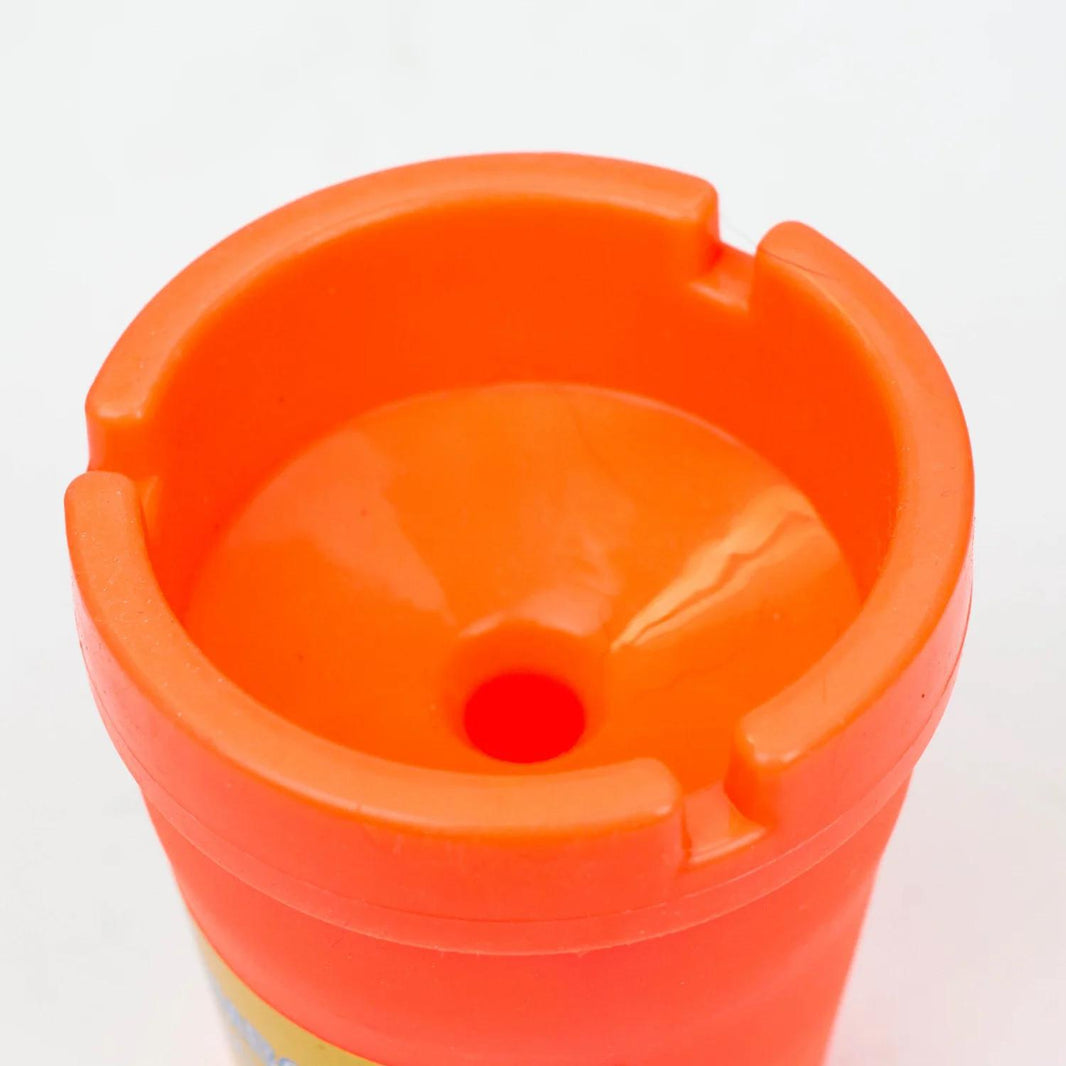 Close-up of a Jumbo Butt Bucket ash tray in bright orange, designed to keep spaces clean and tidy.