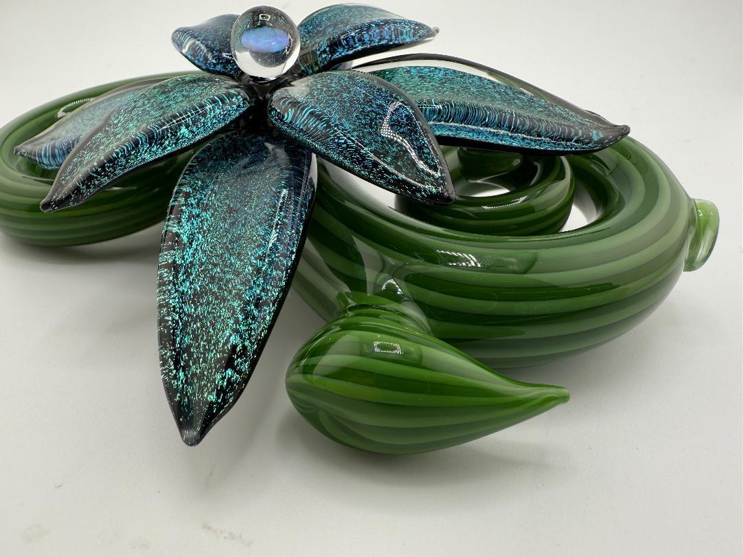 Filla John Spring 2025 Organic Bloom Dichroic Pipe featuring vibrant green leaves and dichroic flower accents.