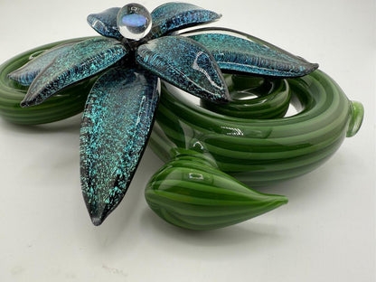 Filla John Spring 2025 Organic Bloom Dichroic Pipe featuring vibrant green leaves and dichroic flower accents.