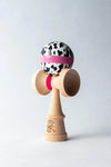 Sweets Mini Kendama in Cow Print design, perfect pocket-sized toy for tricks and creativity.