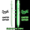 Smyle Limited Edition Glow in the Dark Pen showing white and glowing green versions side by side.