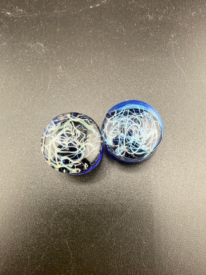Handcrafted Mop Head Glass Gauges in 3/4" size with bold blue and swirl patterns, made in Spokane, WA.