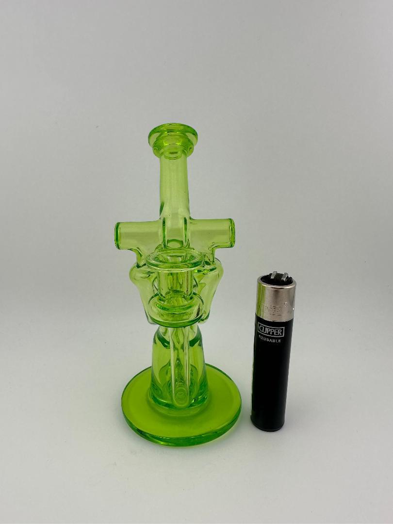 Domer Glass Double Drain Quad Uptake Mini Recycler in vibrant green next to a lighter for scale.