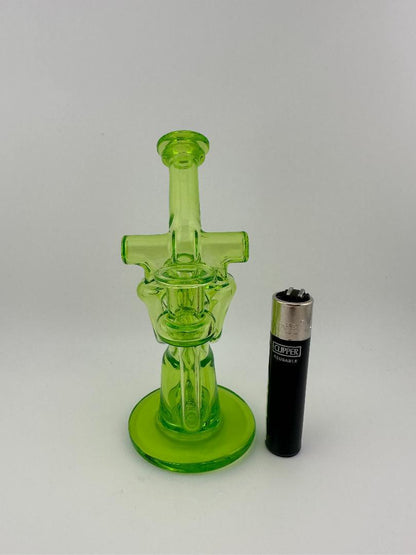 Domer Glass Double Drain Quad Uptake Mini Recycler in vibrant green next to a lighter for scale.