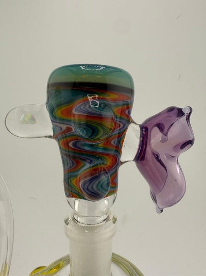 Highgrade Glass Spring Time Slide 14mm with vibrant colors and unique design for smooth smoking sessions.