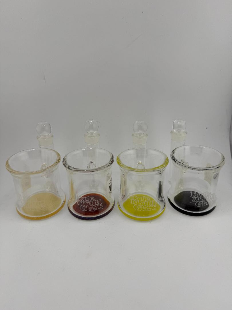 Home Blown Glass Colored Q-Tip ISO Jars in various hues for stylish dab station organization.