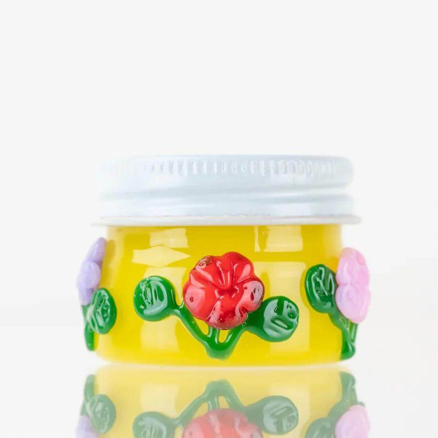 Empire Glassworks Terp Jar with colorful floral designs, perfect for storing concentrates and preserving terpenes.