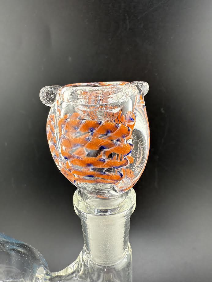 Colorful glass bowl piece with intricate orange and blue design, fitting standard water pipes.