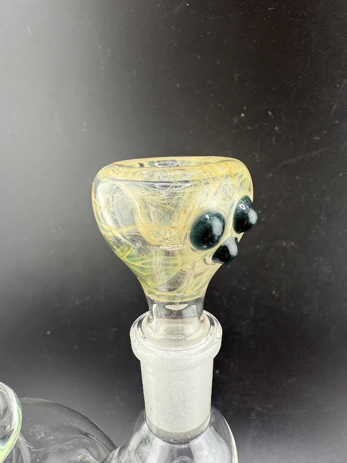 14mm bowl piece with unique skull design, crafted for durability and optimal airflow, fits various devices.