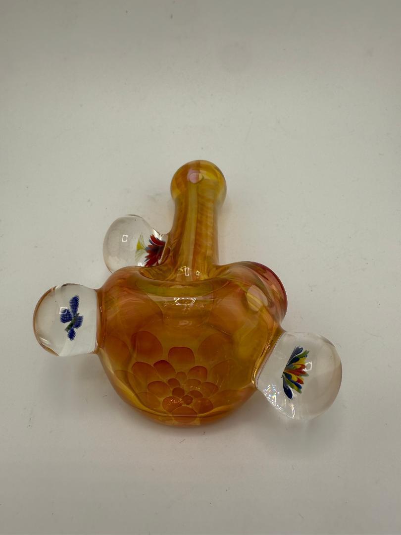 Lylo Glass Heady Fumed Pipe with flower marble accents, showcasing vibrant colors and intricate floral designs.