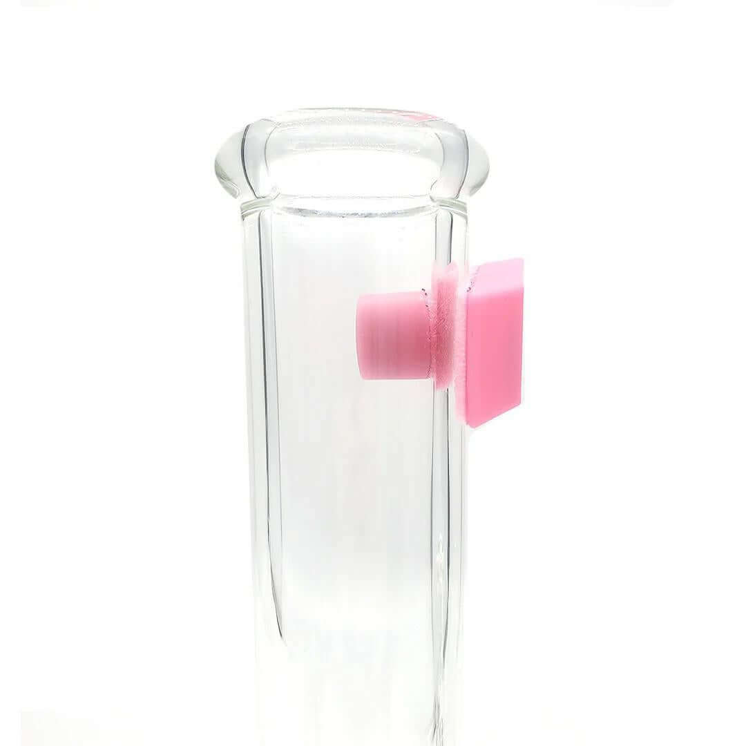 Pink Formula Pink Eraser Scrubber on glass bong for effective and thorough cleaning of hard-to-reach areas.