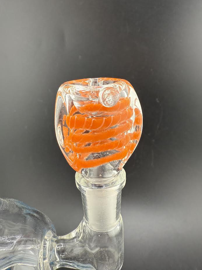 Orange swirl 14mm flat face bowl piece, made from durable borosilicate glass for smooth packing and style.