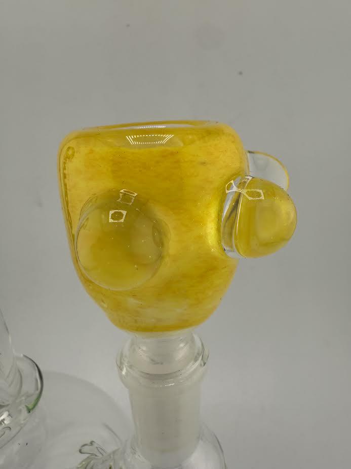 Close-up of a Crondo Glass Frit 14mm bowl piece in vibrant yellow color with unique textures.