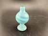 Bolt Up Bubble Cap in aqua color with swirled design, perfect for enhancing the smoking experience.