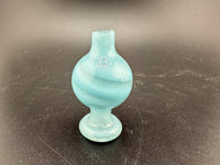 Bolt Up Bubble Cap in aqua color with swirled design, perfect for enhancing the smoking experience.