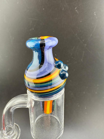 Filla John Line Worked Bubble Cap with vibrant colors and intricate design for enhanced dabbing performance.