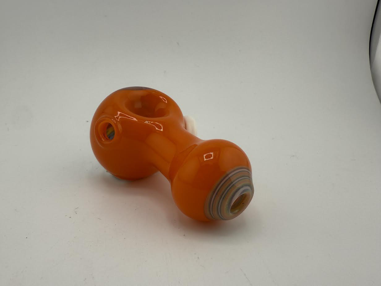 Mcdoogle Dry Pipe in vibrant orange color, showcasing sleek design and smooth finish, perfect for smoking accessories.