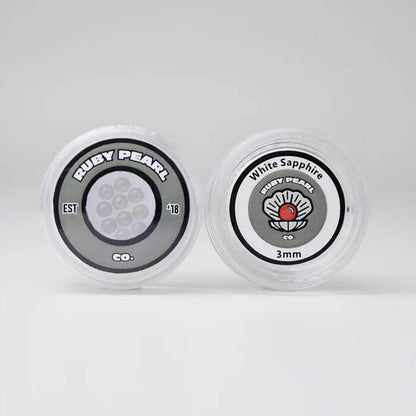 Ruby Pearl Co containers showcasing Clear and White Sapphire terp pearls for optimal dabbing performance.