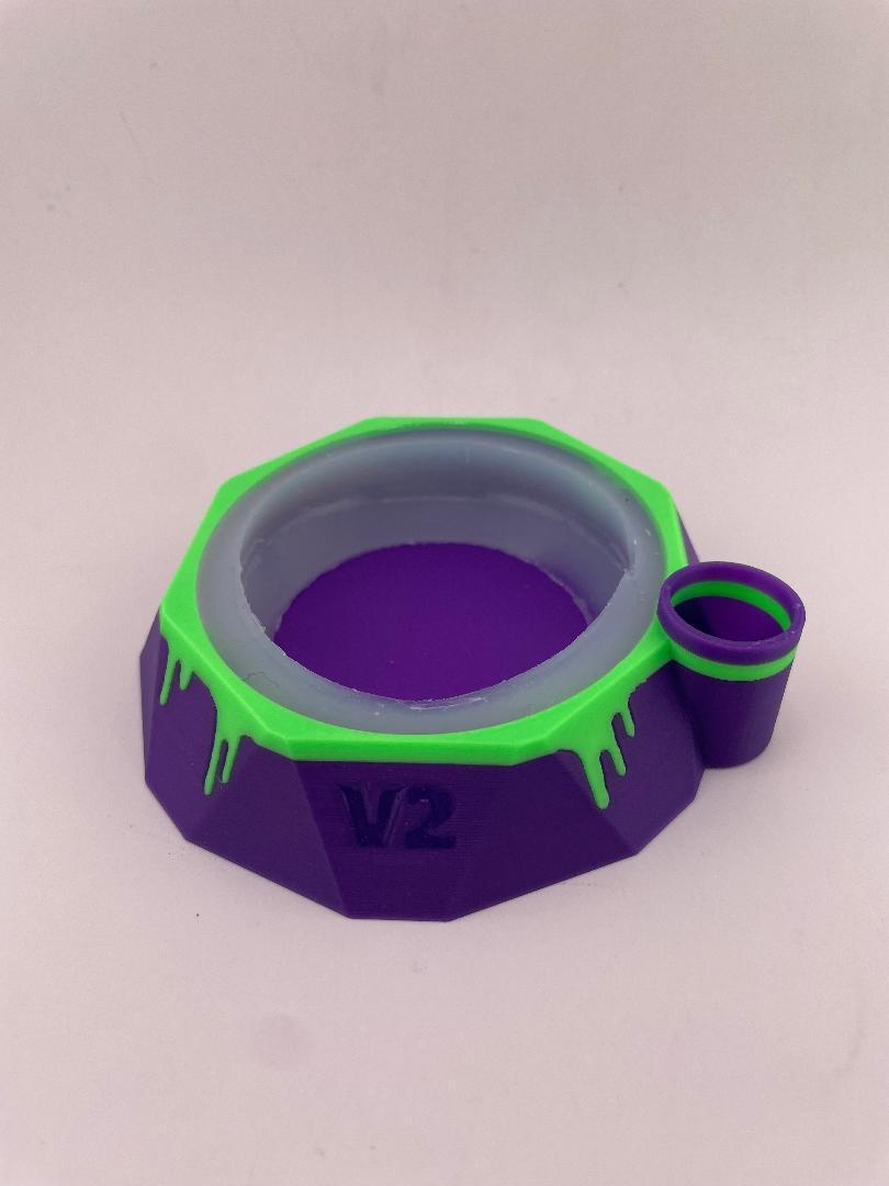 Focus V Carta 2 base stabilizer in purple and green with Saber Hot Knife Holder holder.