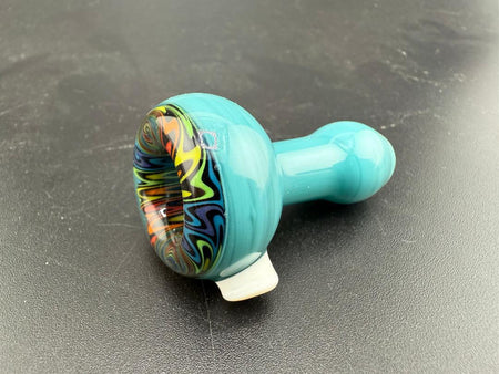 Handcrafted Mcdoogle Glass Chillum in turquoise with vibrant swirls, showcasing artisan glasswork from Spokane, WA.