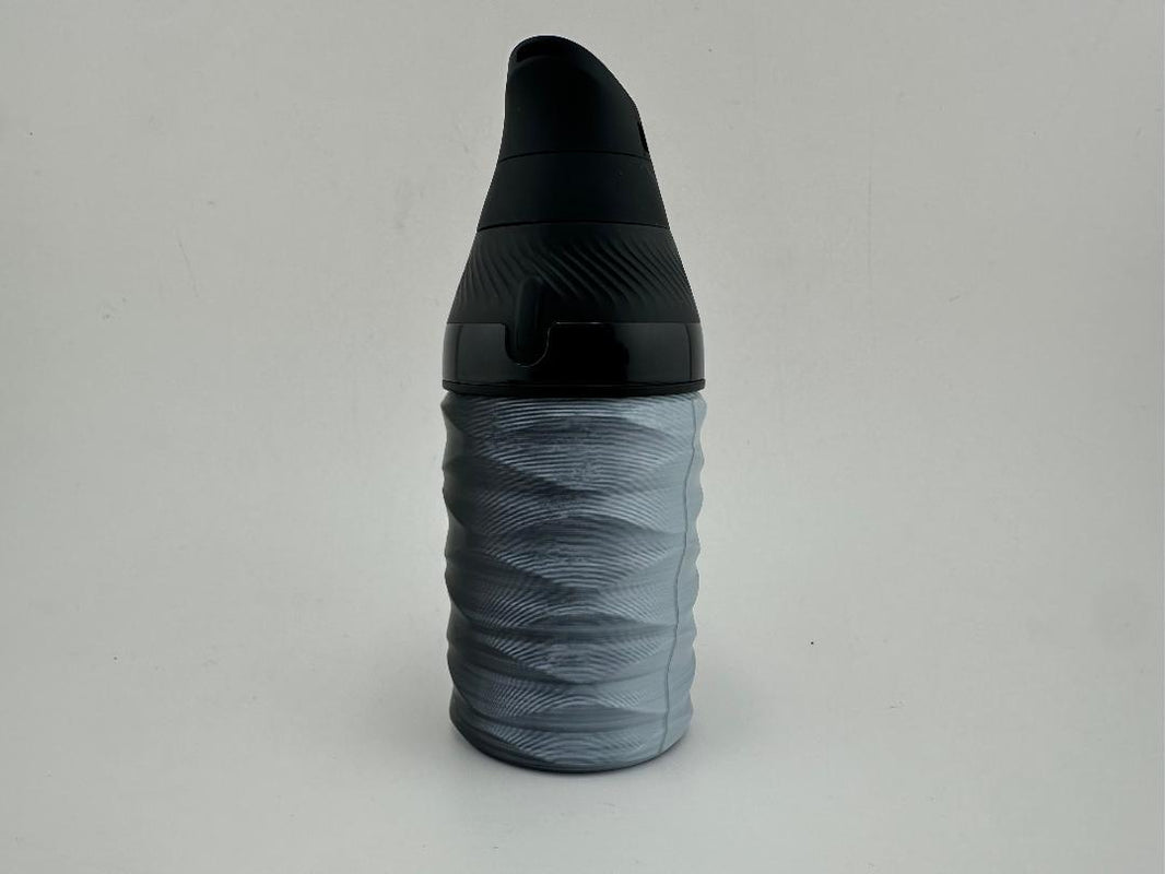 custom 3d printed puffco proxy core cup in textured gray and black finish, designed for enhanced grip and style.