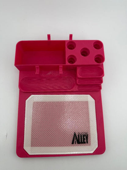 Nikk Drips 3D Printed Dab Station in vibrant pink with compartments and silicone slick work area.