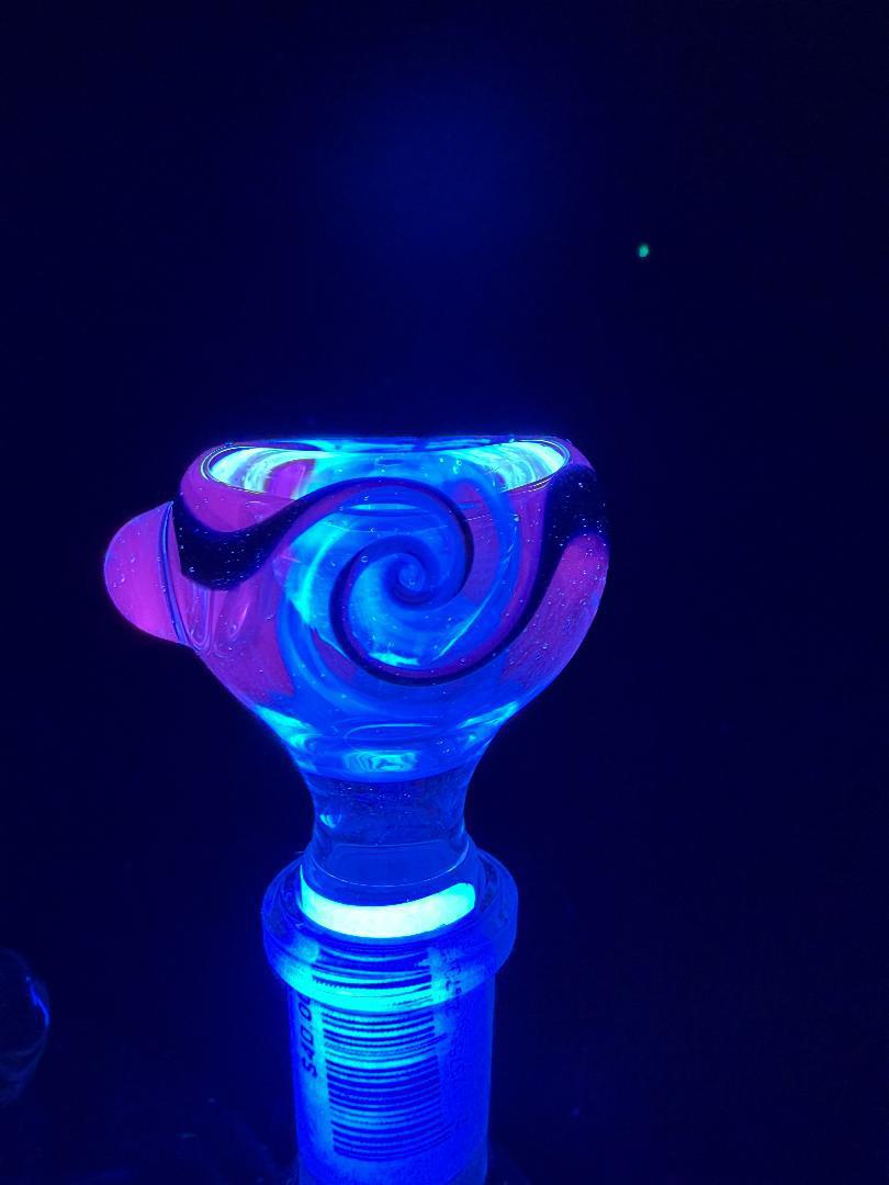 Filla John Black Light UV 14mm Bowl glowing under black light, showcasing vibrant colors and premium glass craftsmanship.