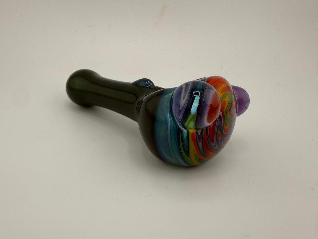 Highgrade glass rainbow wig wag spoon pipe with opal accents, featuring vibrant spiraled colors in durable borosilicate glass.