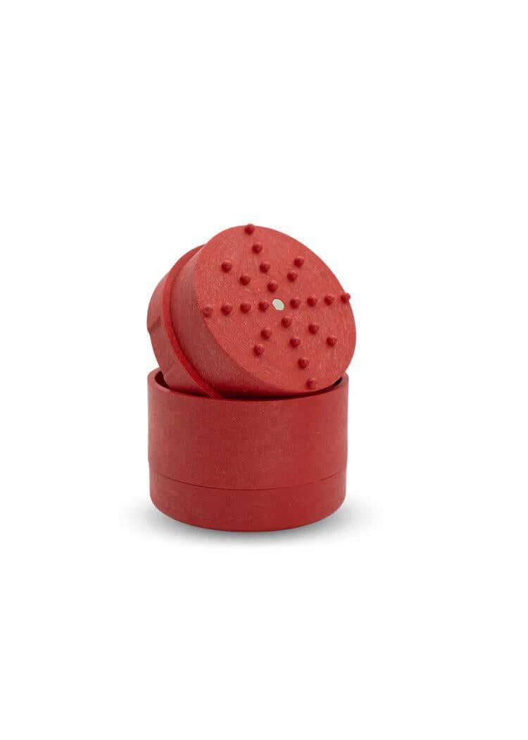 Stache Hemp Grinder in red showing top and bottom pieces for efficient herb grinding.