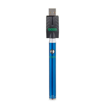 Ooze Twist Pen Slim in blue color with USB charger, ideal for vaping oil cartridges and wax attachments.