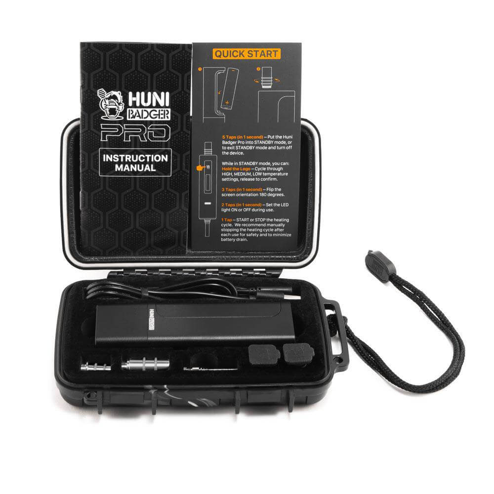 Huni Badger Portable Device Pro in a compact case with instruction manual and accessories for easy herbal extract consumption.