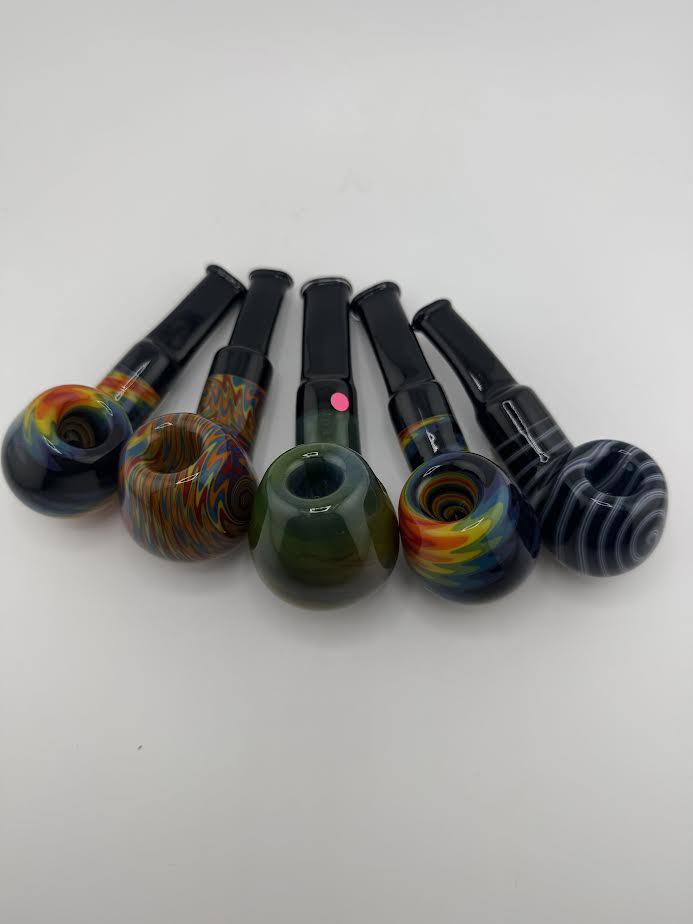 Five colorful Mcdoogle Gentleman's pipes in various patterns and designs, showcasing intricate glasswork.