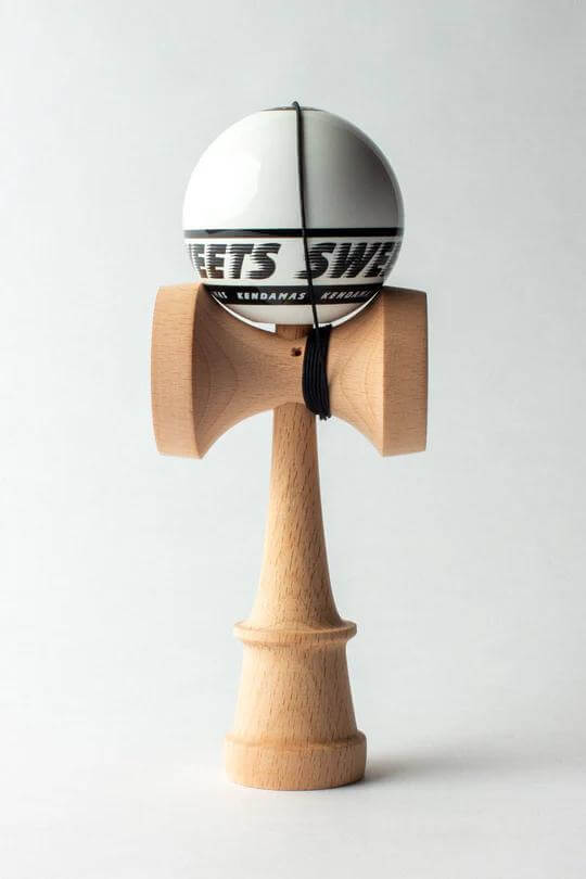 Sweets Kendama Starter - Sticky Clear, perfect for beginners, featuring KEN Amped Shape for easy play and community learning.